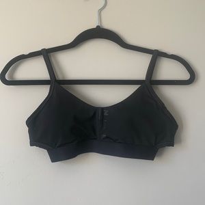 Nike padded sports bra with crossing detail